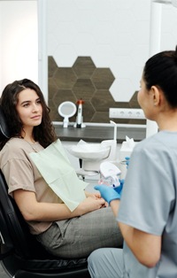 Woman at cosmetic dentist consultation