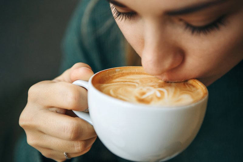 young woman drinking coffee
